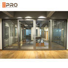 La polvere di progettazione moderna ha ricoperto i portelli scorrevoli di alluminio per le porte di vetro di scivolamento automatiche commerciali facoltative di colore dell'ufficio