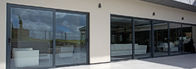 Porte di vetro di scivolamento di alluminio di colore di RAL con le porte scorrevoli grige di finitura di superficie del patio delle porte del patio dello schermo PVDF della mosca